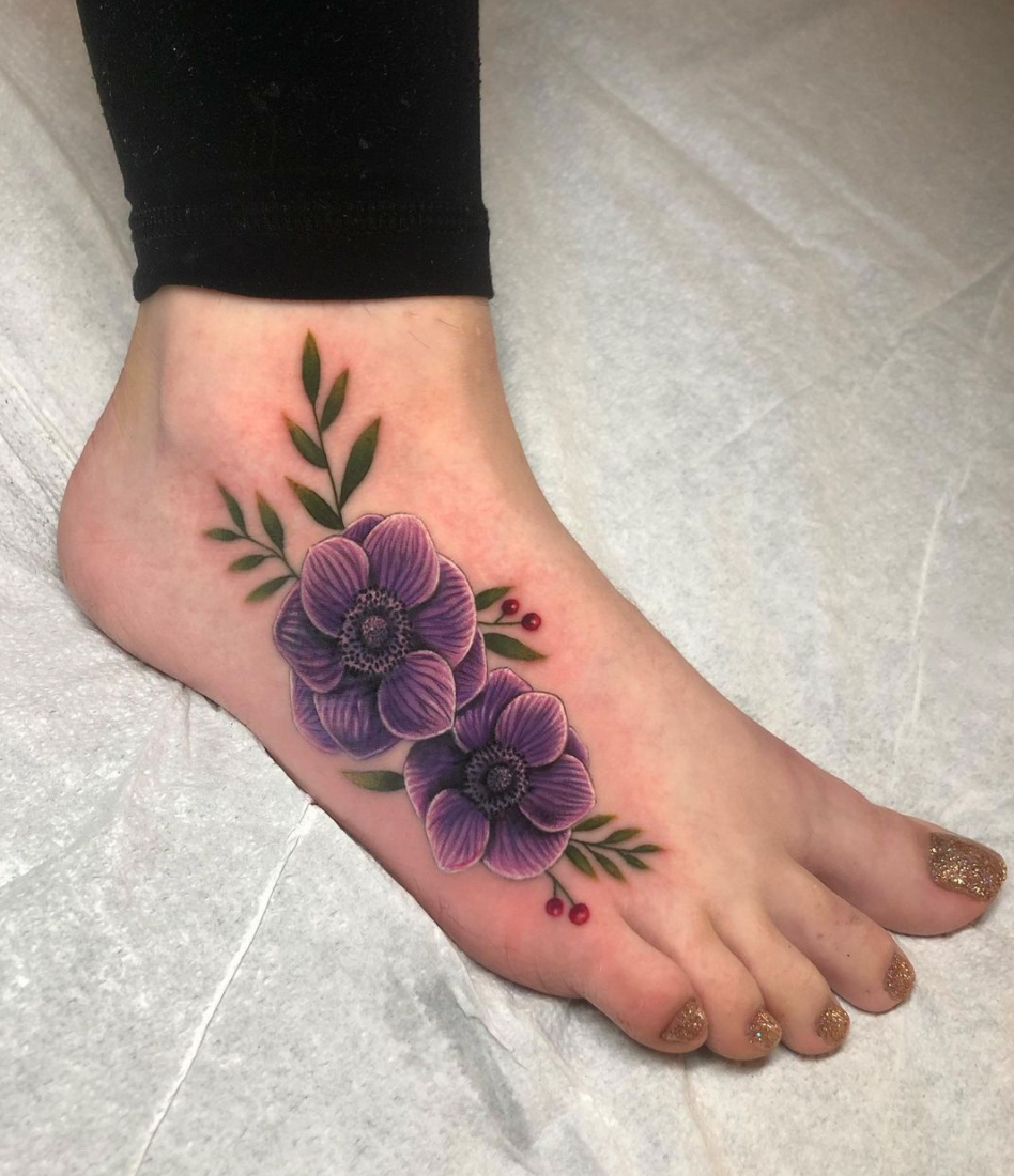 Floral tattoo by Megan Massacre