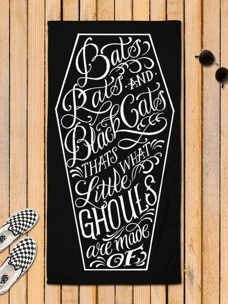 large black and white beach towel with a coffin design by Megan Massacre