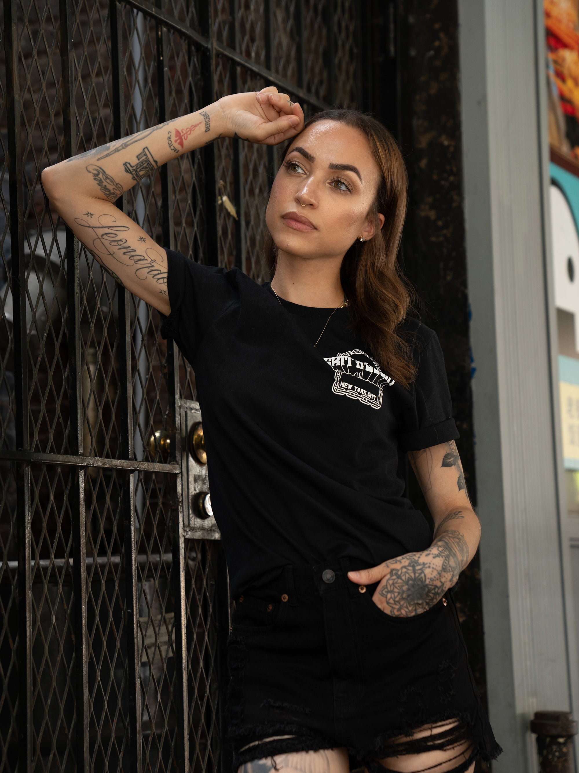 black t-shirt with Grit N Glory skull surrounded by chains 