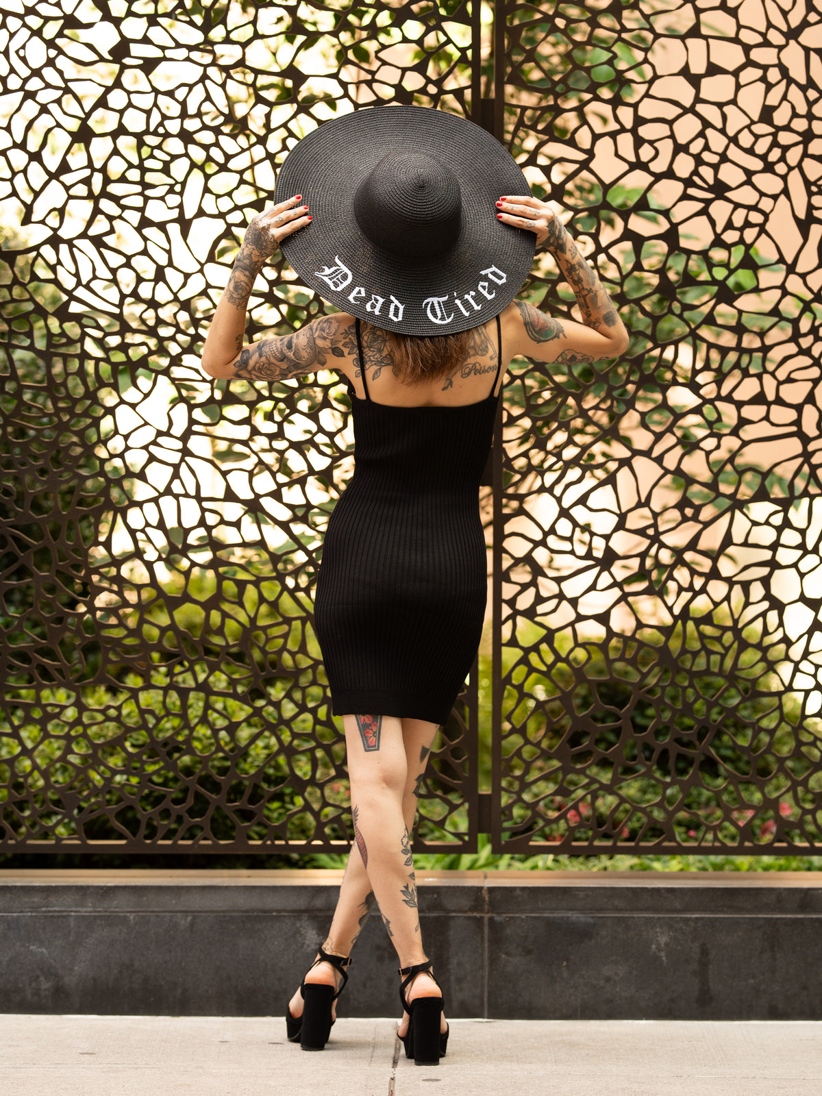 Janice Danger wearing the Dead Tired black sun hat with the As She Was Mini Dress