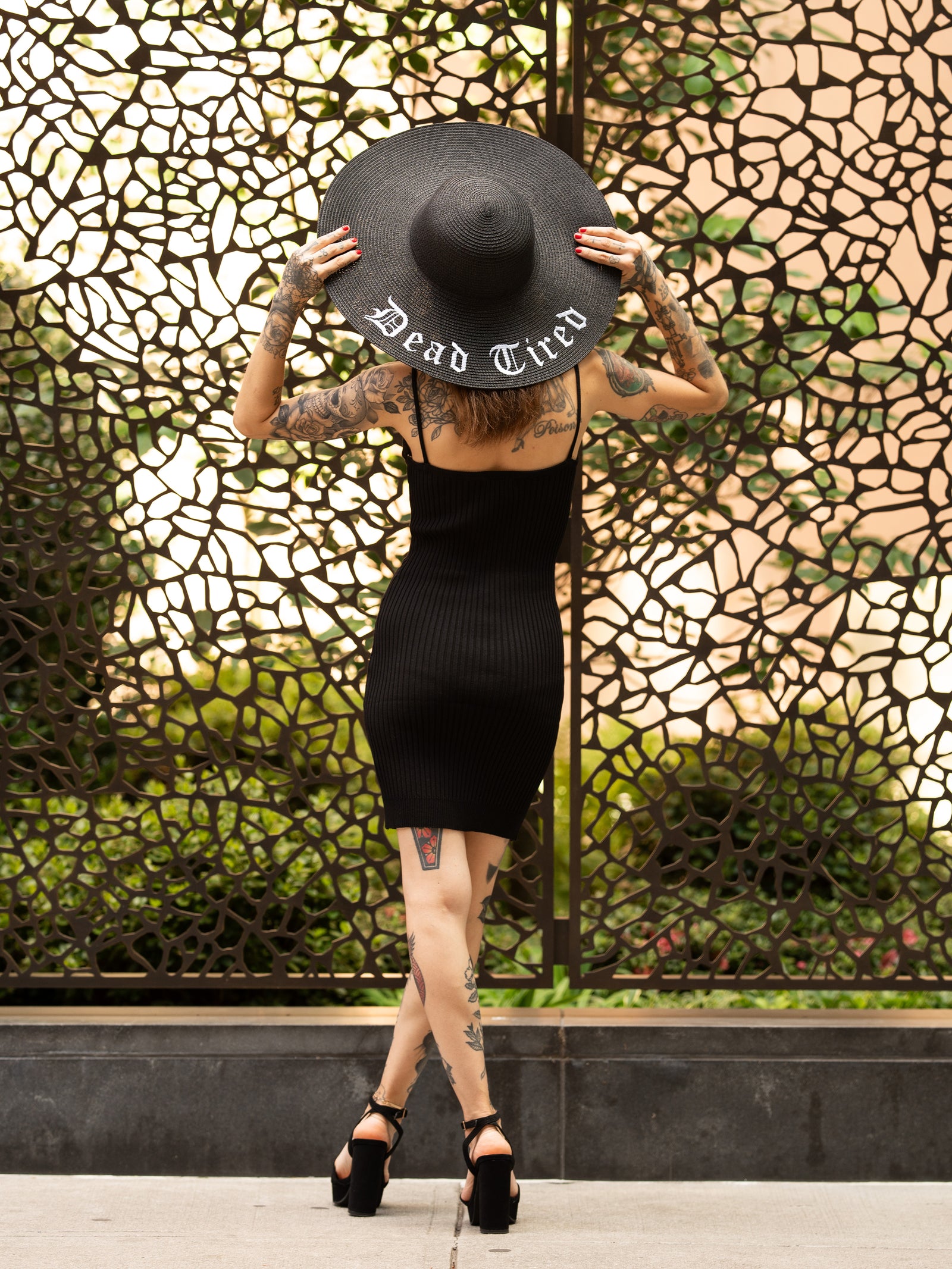 Janice Danger wearing the Dead Tired black sunhat and the As She Was Mini Dress