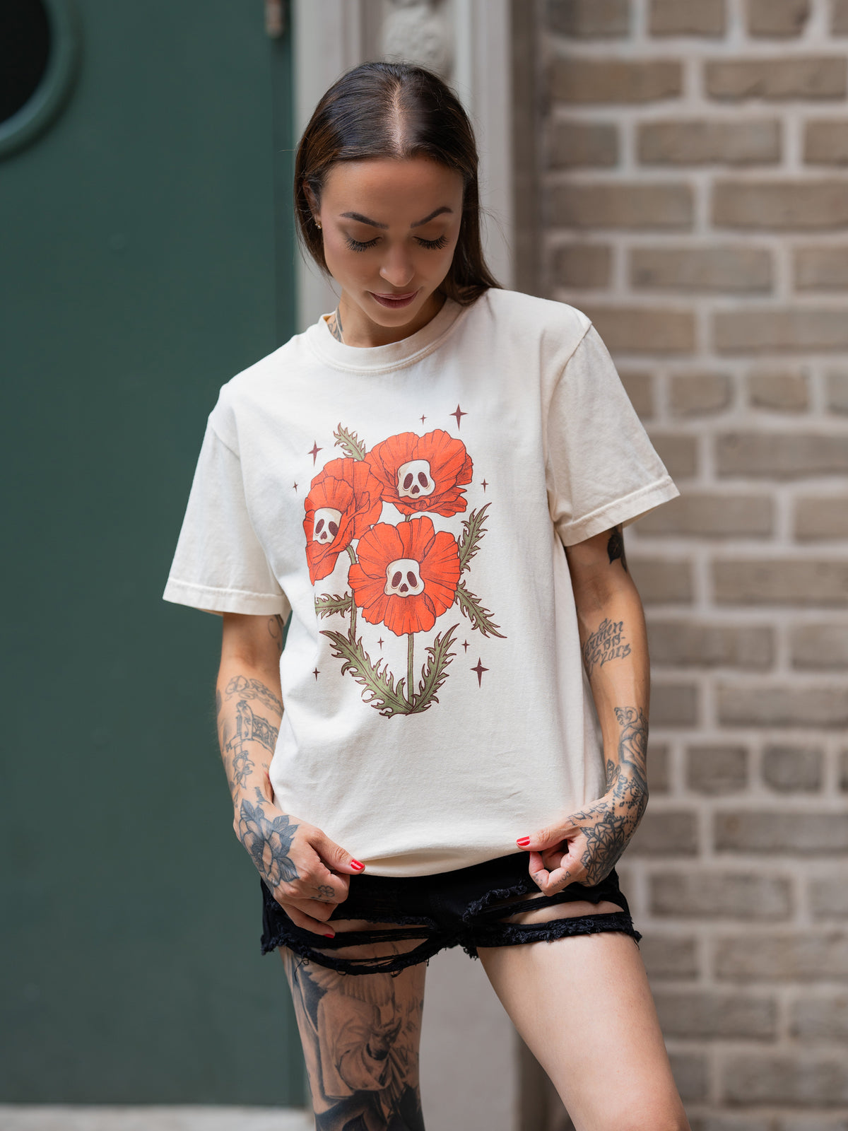 Janice Danger wearing a unisex, off white skull flowers t-shirt 