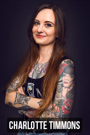 photograph of Charlotte Timmons with link to her portfolio page. Charlotte specializes in neo-traditional tattoos with a focus on natural, whimsical themes. 