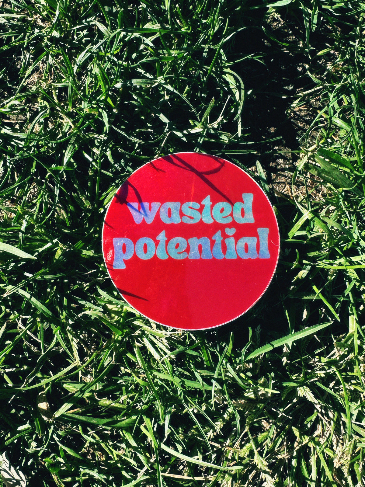 Wasted Potenital Circle Sticker