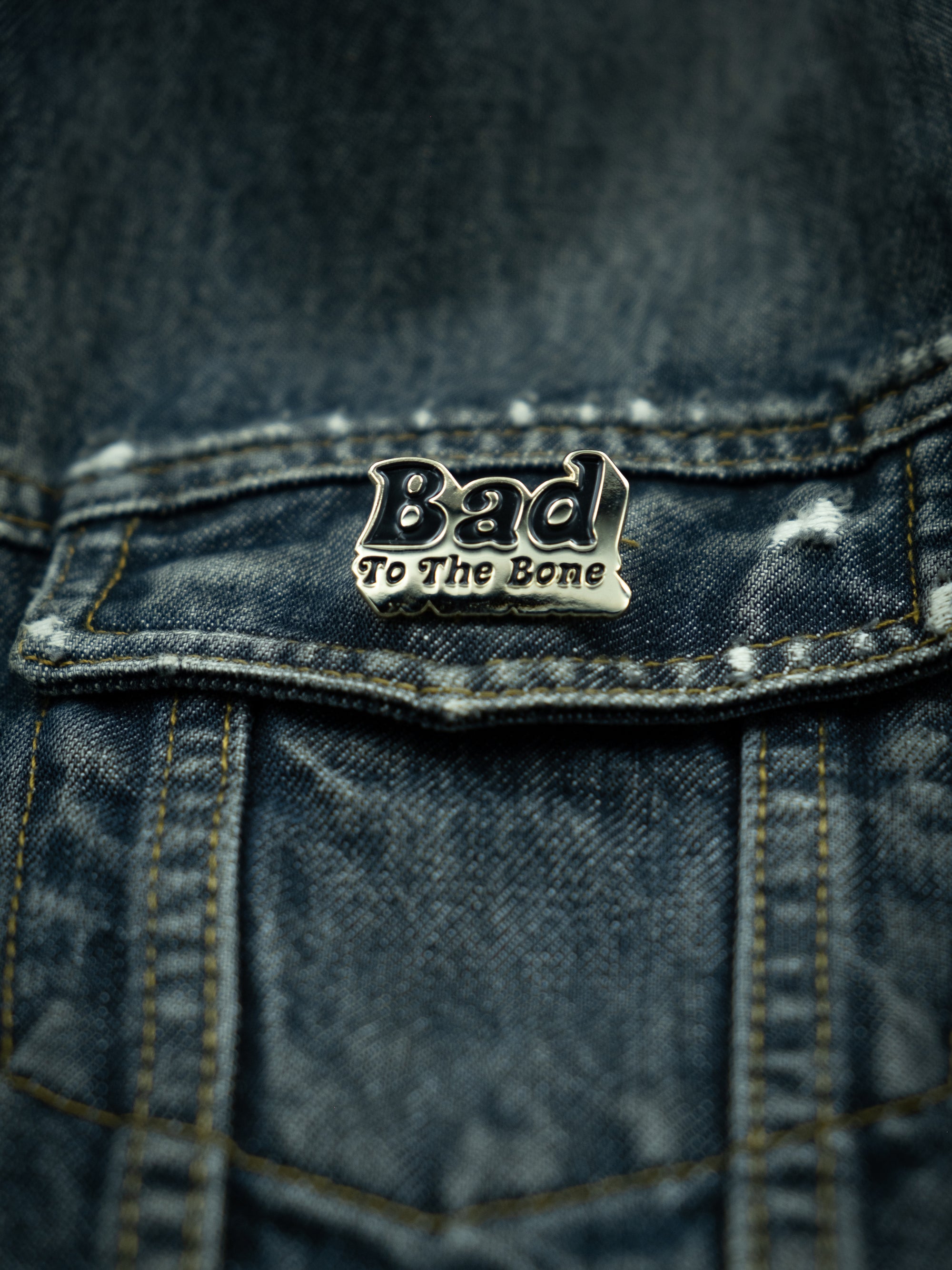 Bad to the Bone Enamel Pin