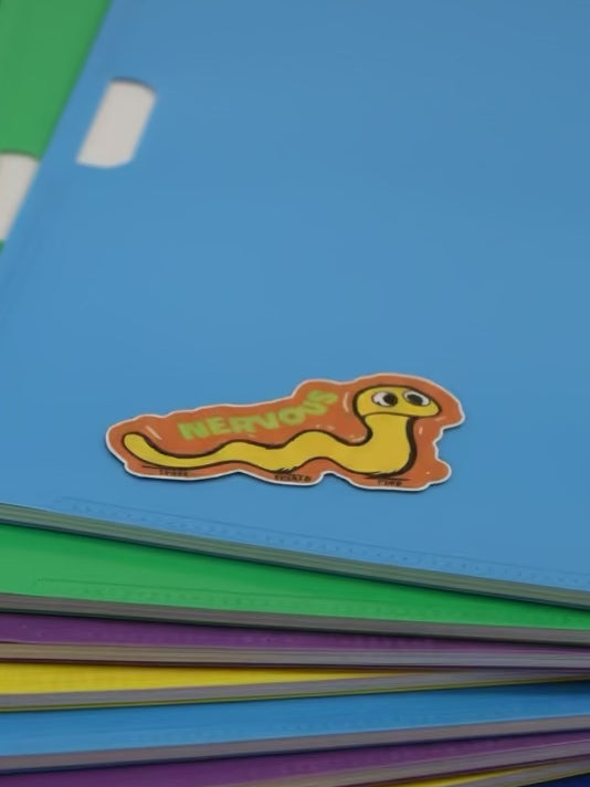 Colorful folders with a cartoon worm sticker labeled 'Nervous' on a blue folder.