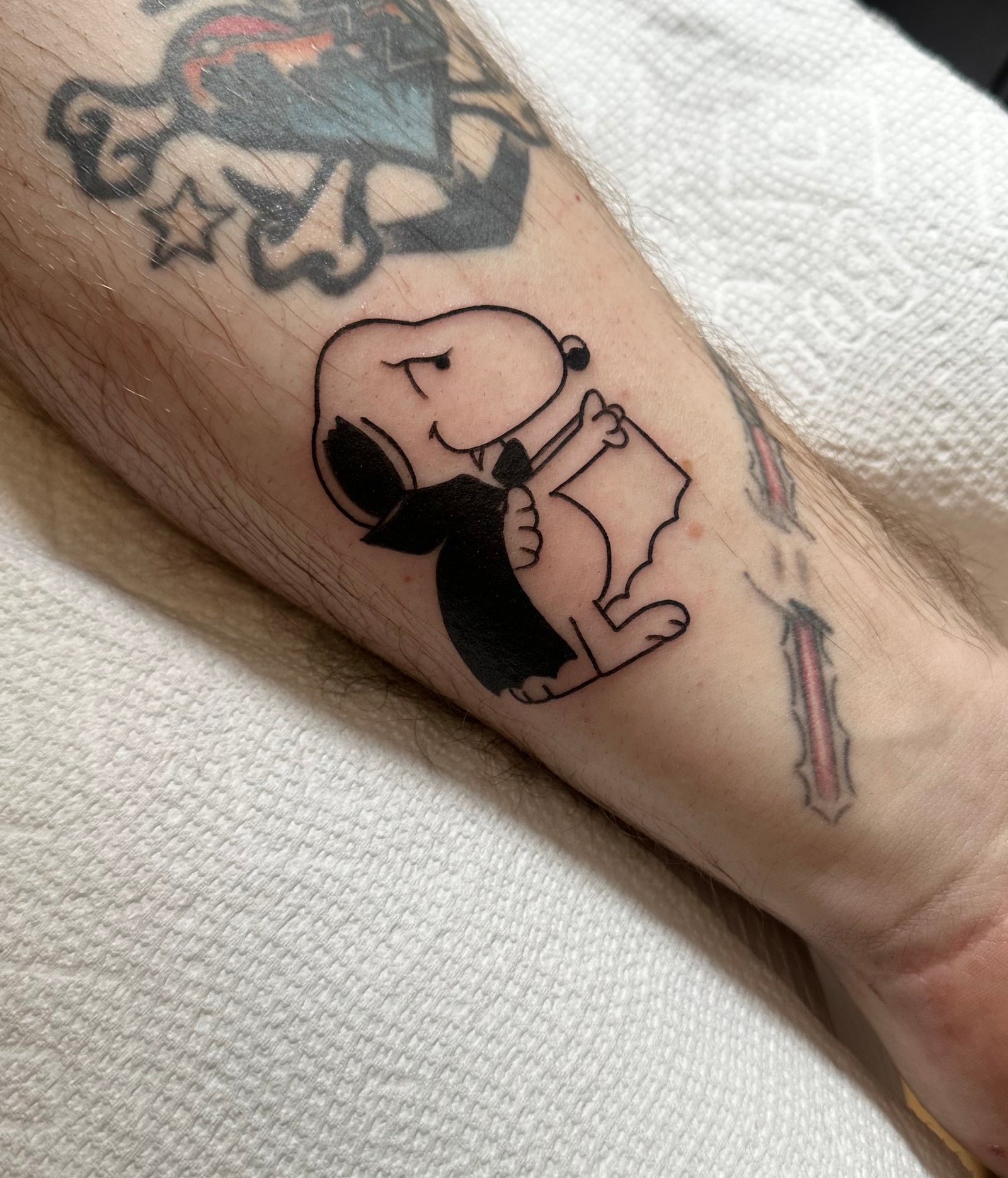 Blackwork vampire halloween themed snoopy tattoo by Miss Vampira at Grit N Glory