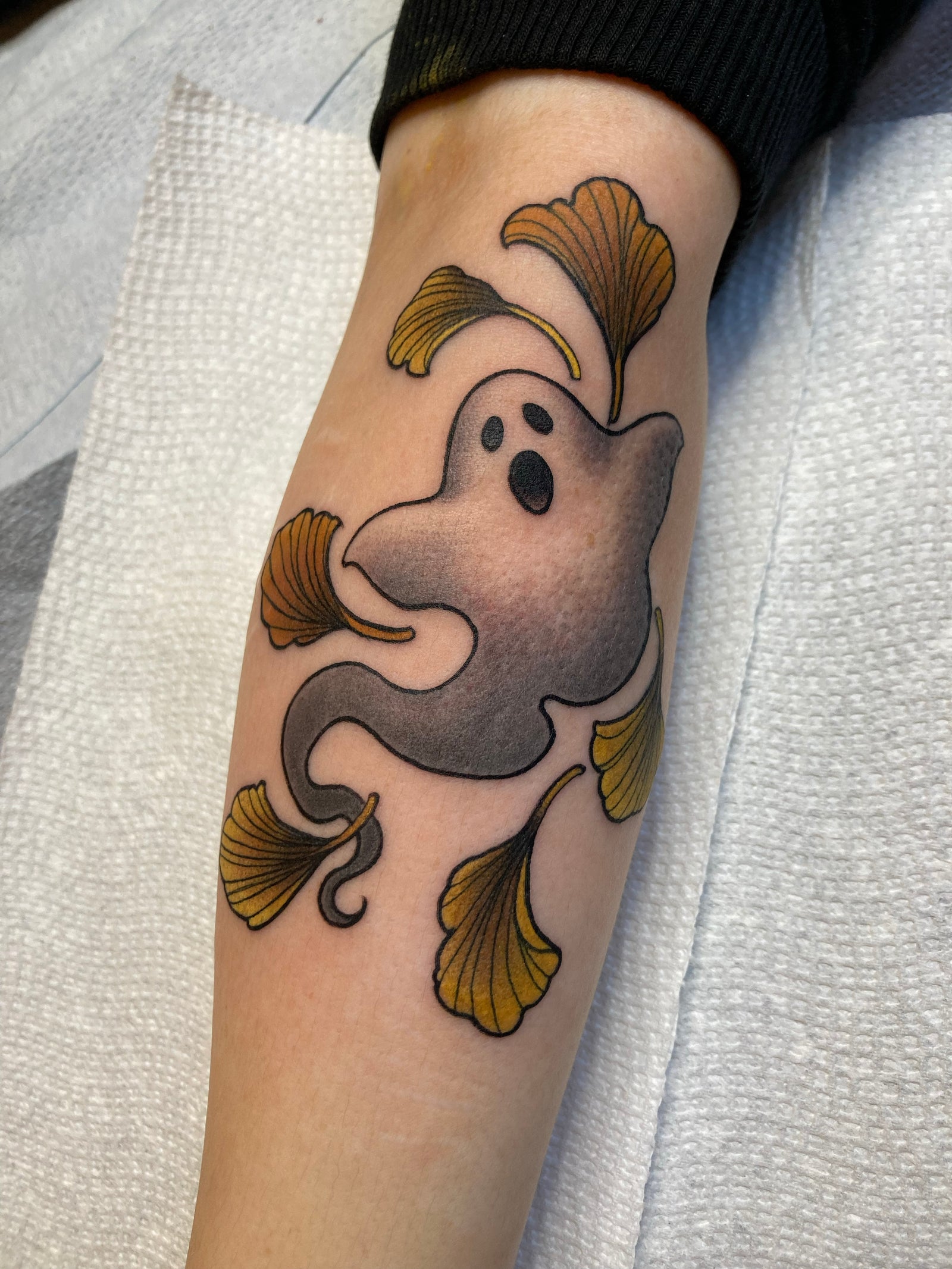 Neo traditional color ghost and leaves tattoo by Charlotte Timmons