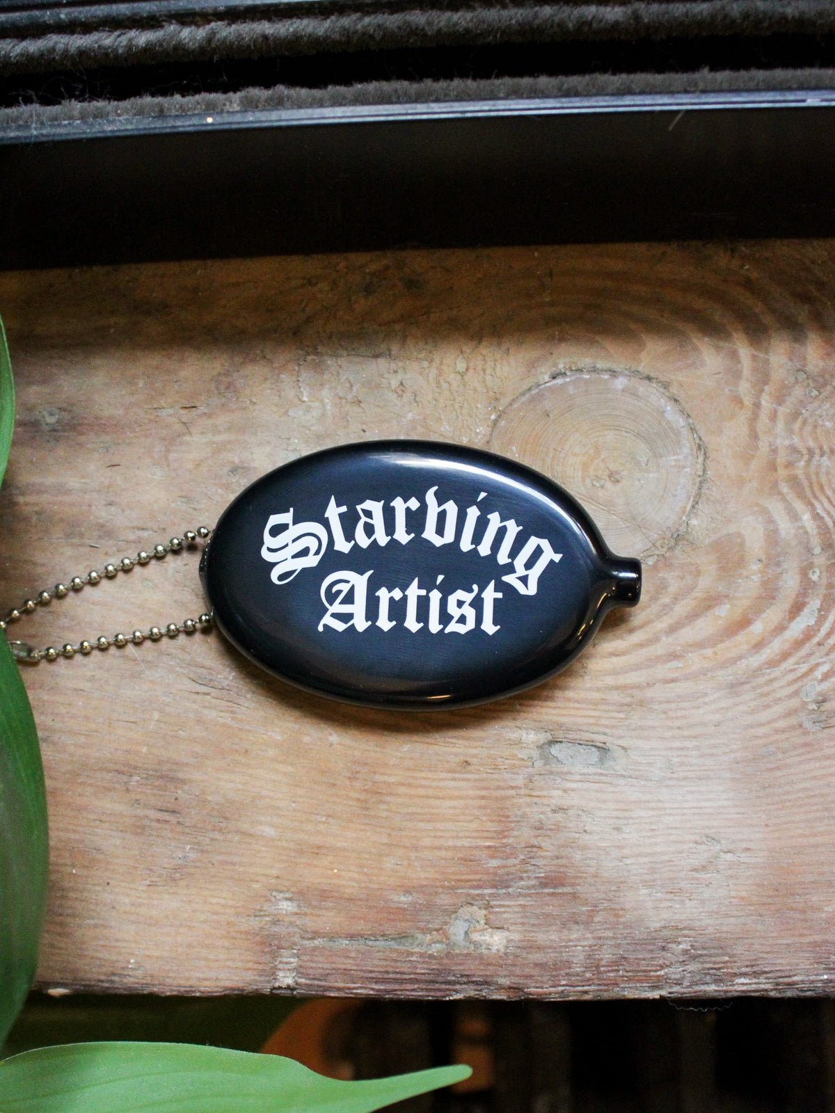 Starving Artist black vinyl coin pouch keychain