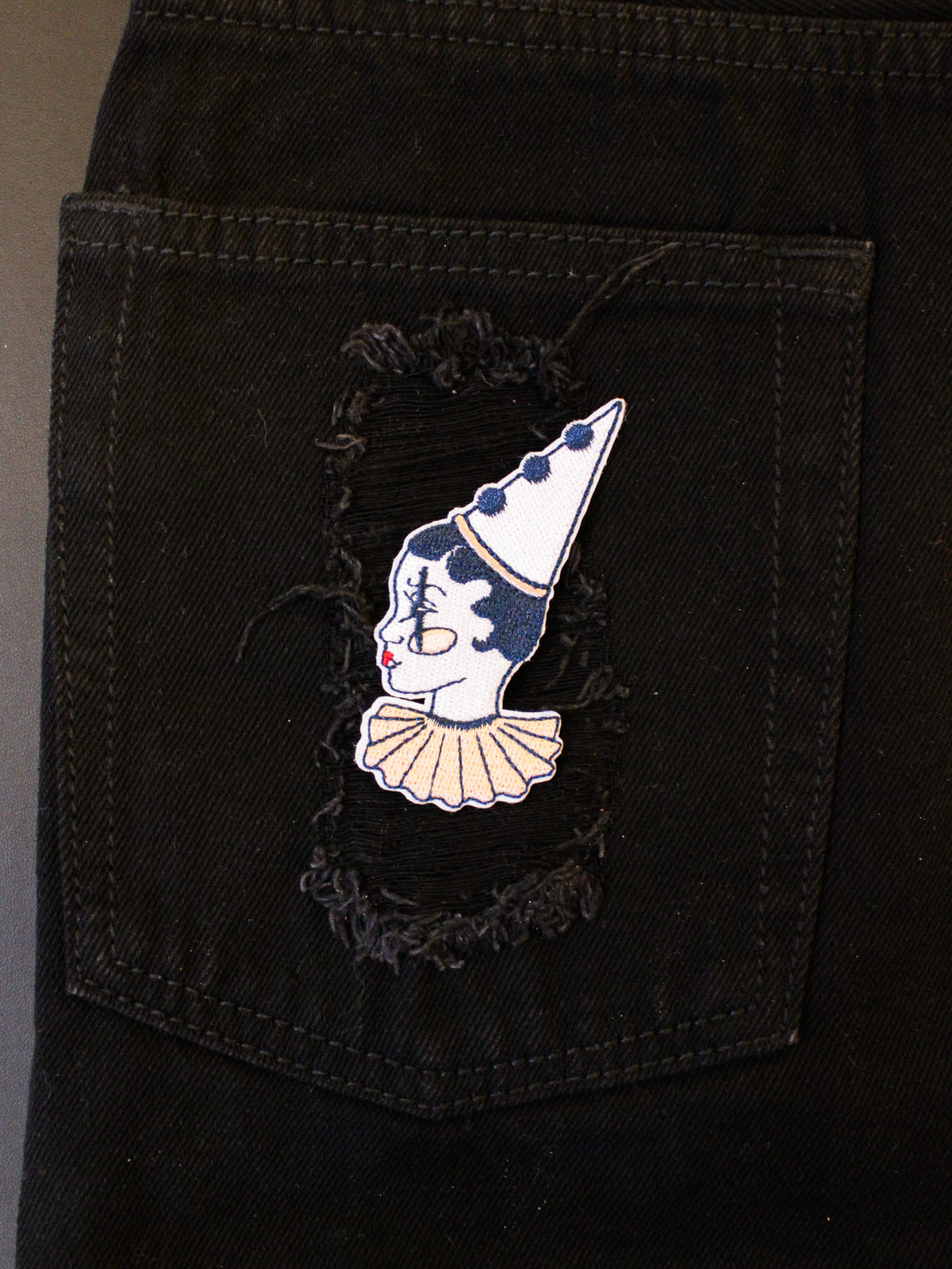 blue, soft pink and white Clown Girl embroidered patch