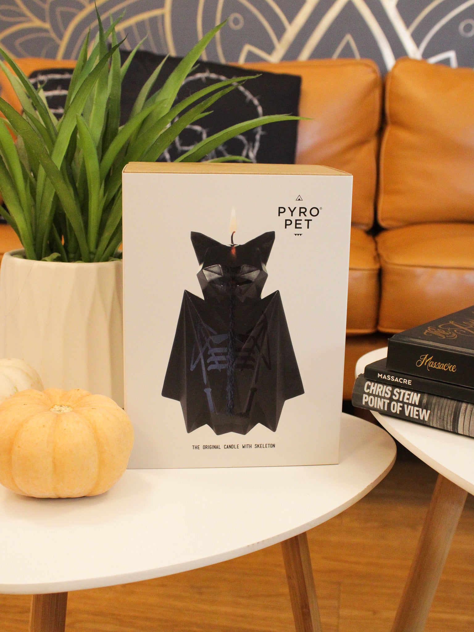 Bat shaped candle with black wax and one wick