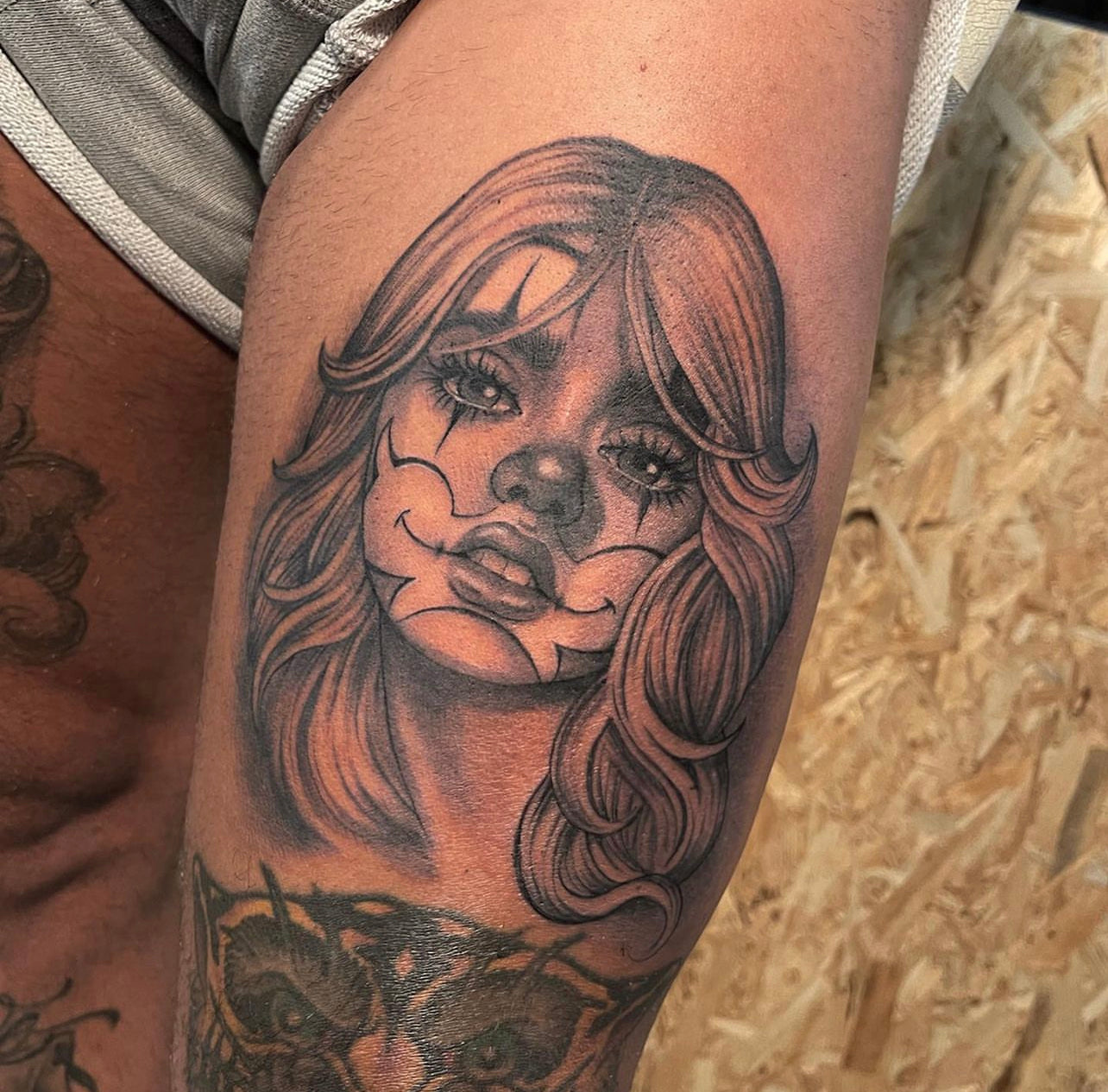 black and gray clown girl tattoo by Elvia Guadian