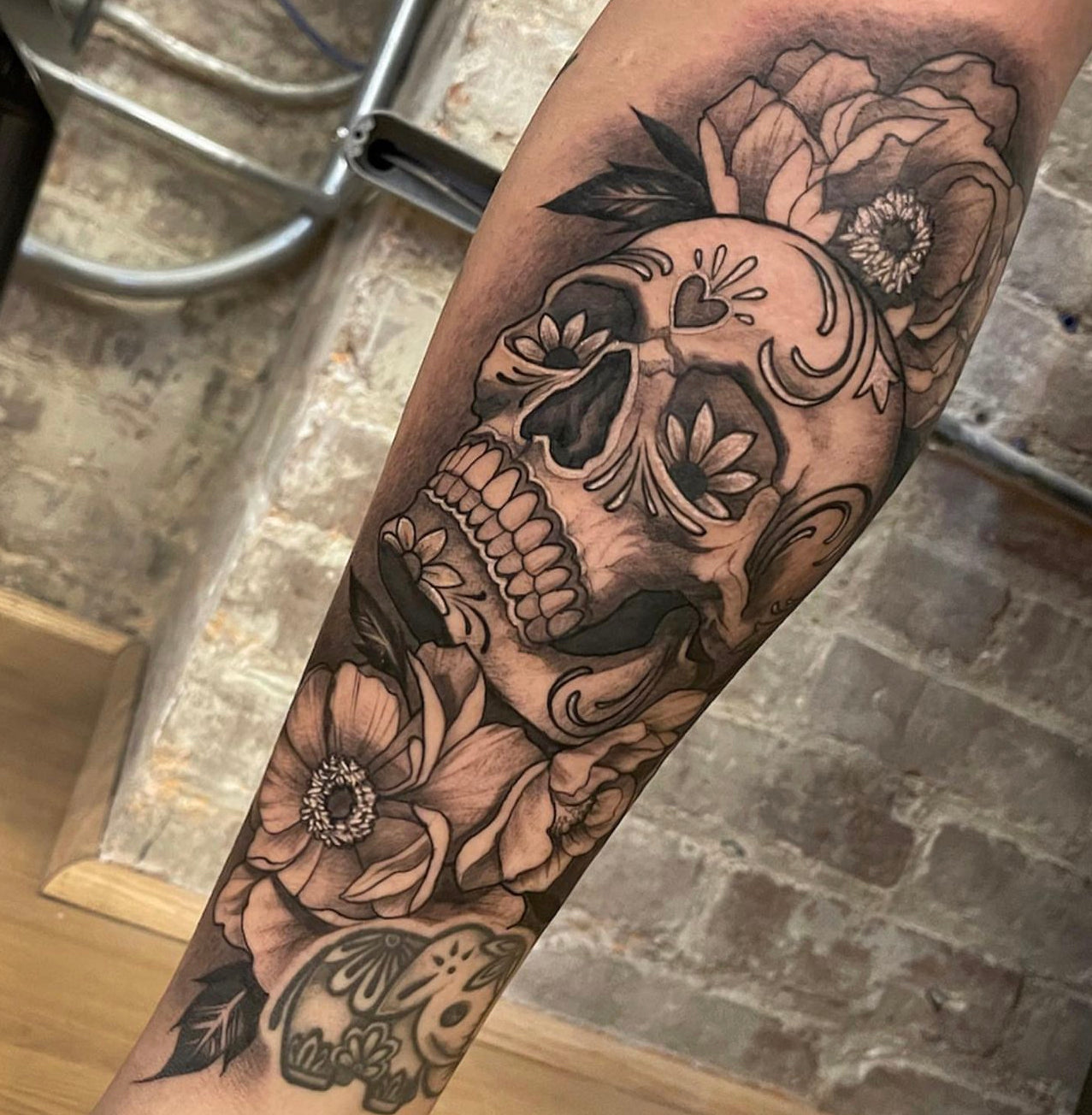 black and gray sugar skull tattoo by Elvia Guadian