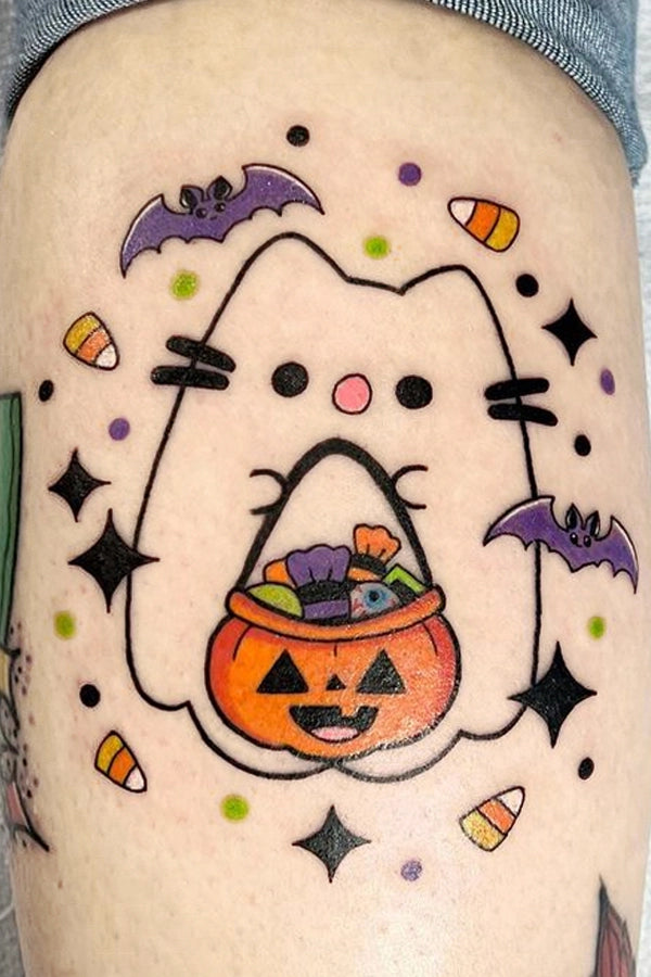 Cute and spooky spoopy Halloween tattoo with candy corn, jack o lantern bats and ghost by Jessica V