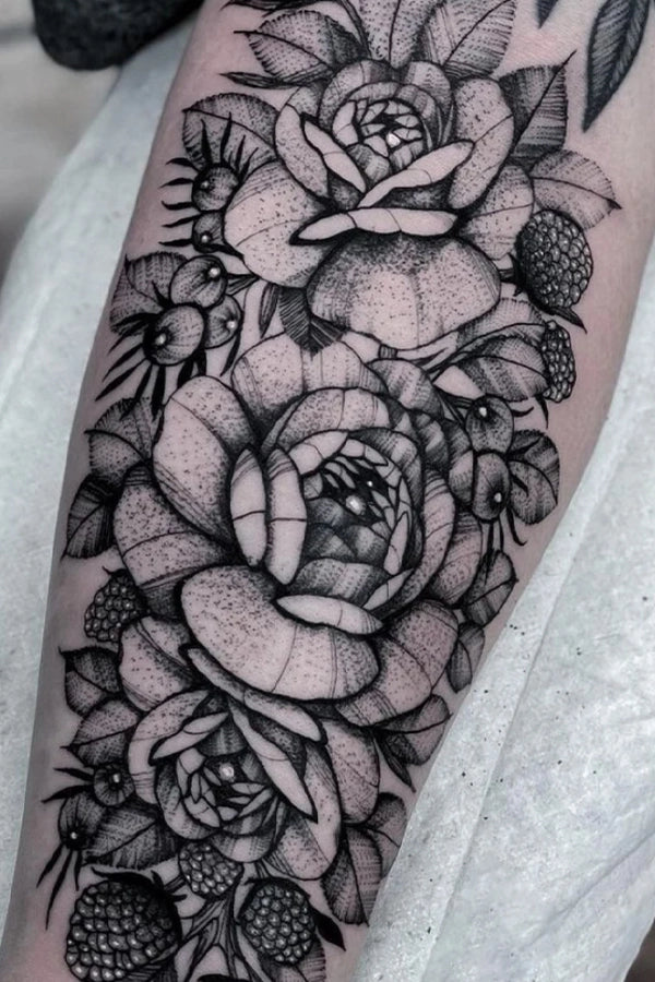 delicate blackwork floral tattoo by Nate Silverii