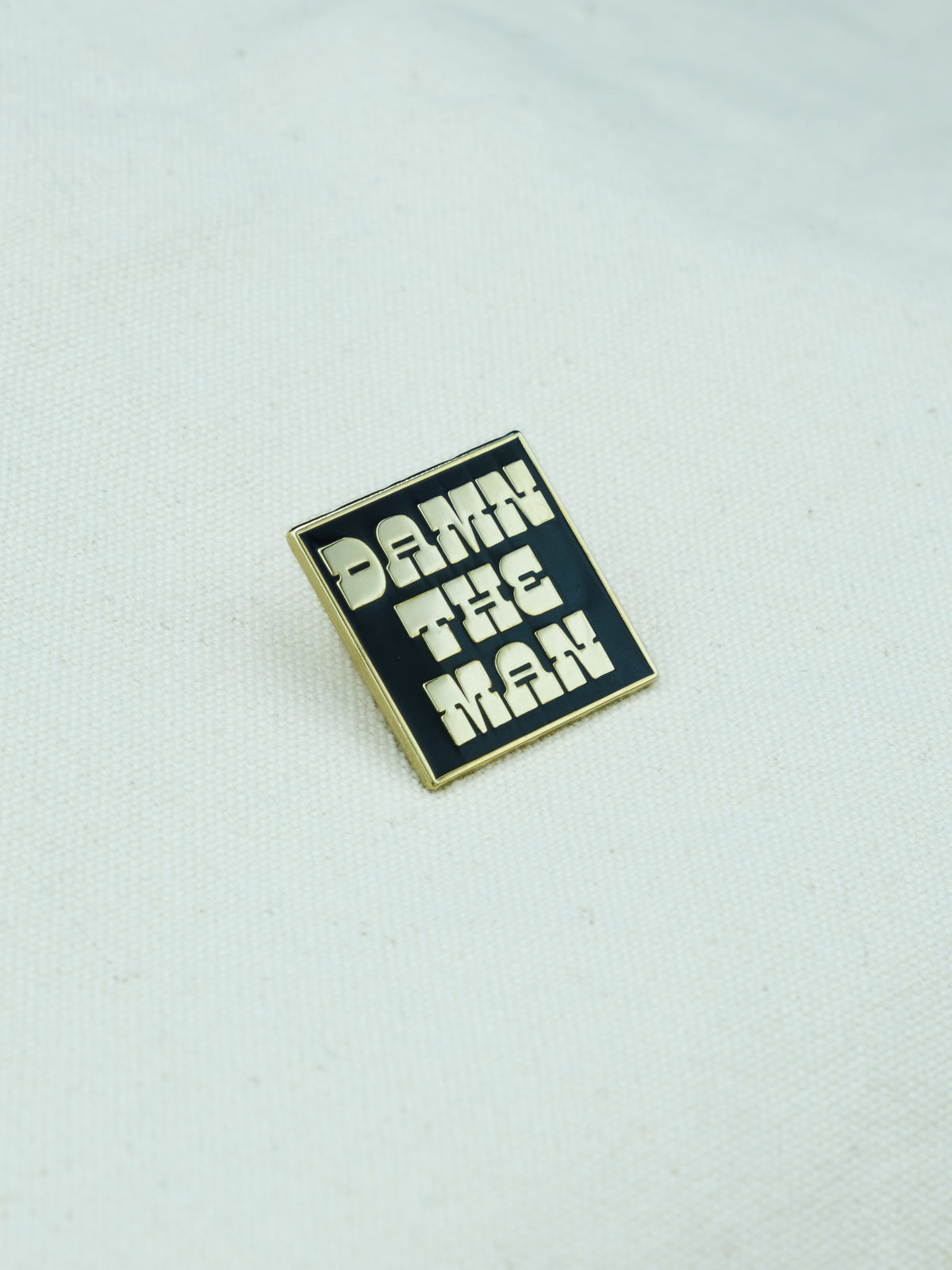 Damn The Man Enamel Pin