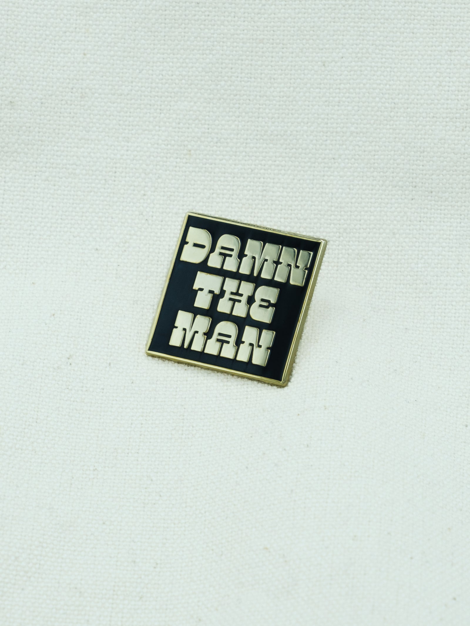 Damn The Man Enamel Pin