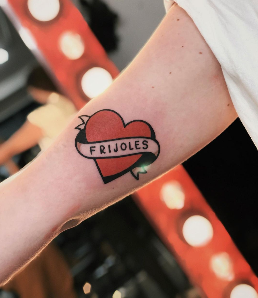 Frijoles traditional heart with banner color arm tattoo by Cavan Infante inner bicep 