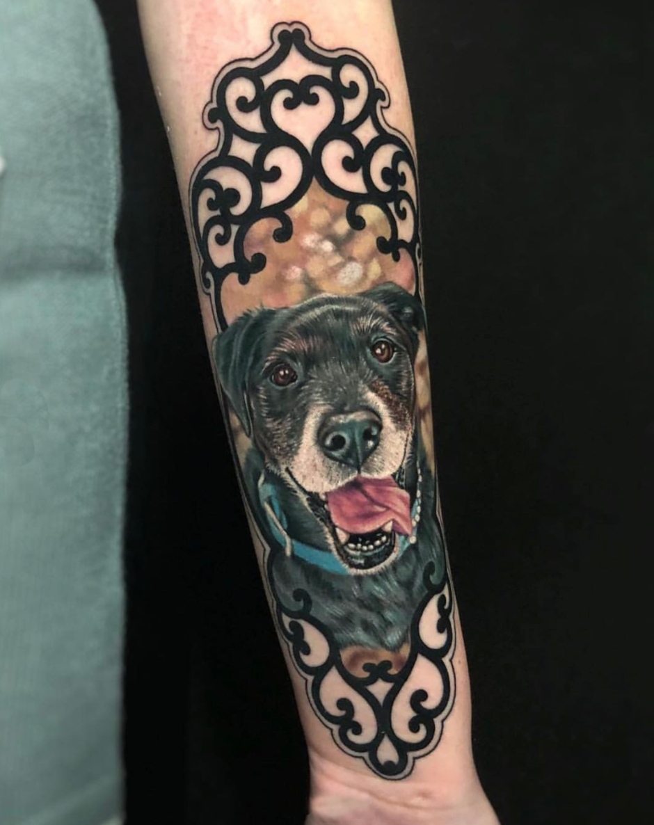 Dog portrait with a frame tattoo by Megan Massacre