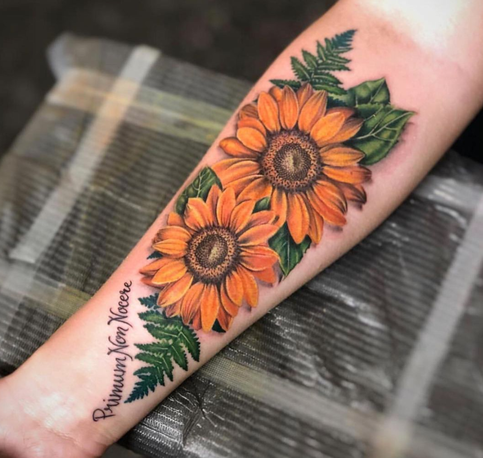 color realism sunflower tattoo by Megan Massacre