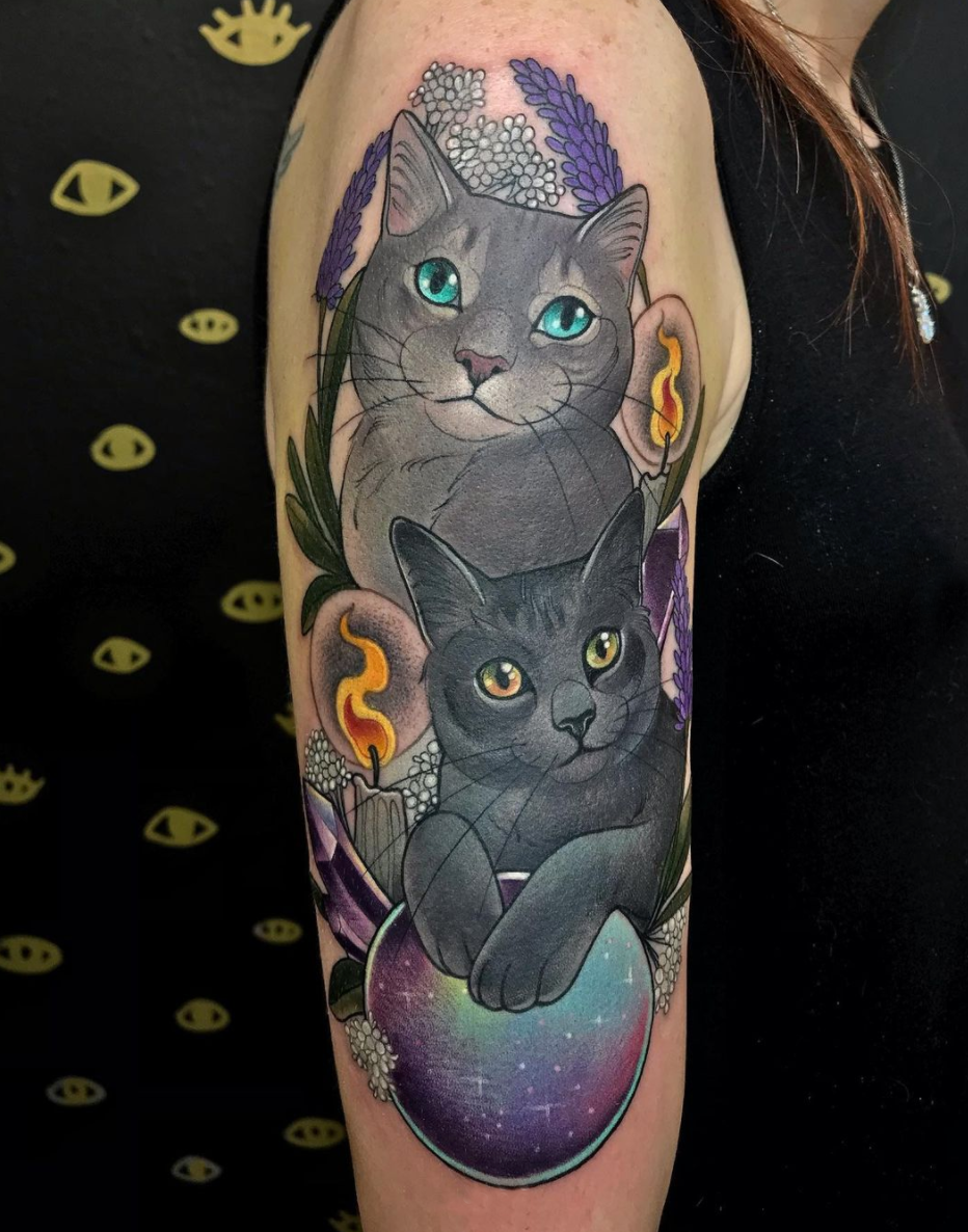 neo traditional cat crystal ball upper arm color tattoo by Charlotte Timmons