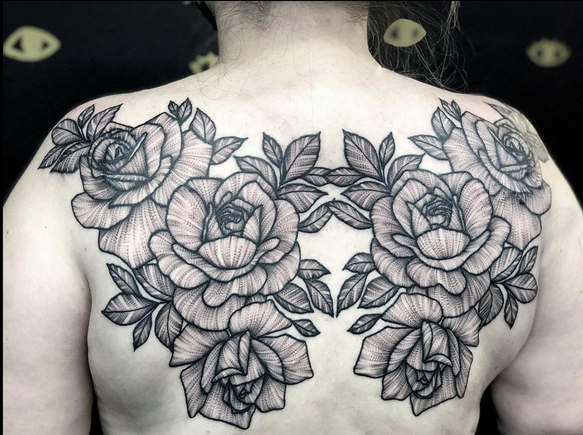 blackwork floral symmetrical roses back tattoo by Janice Danger