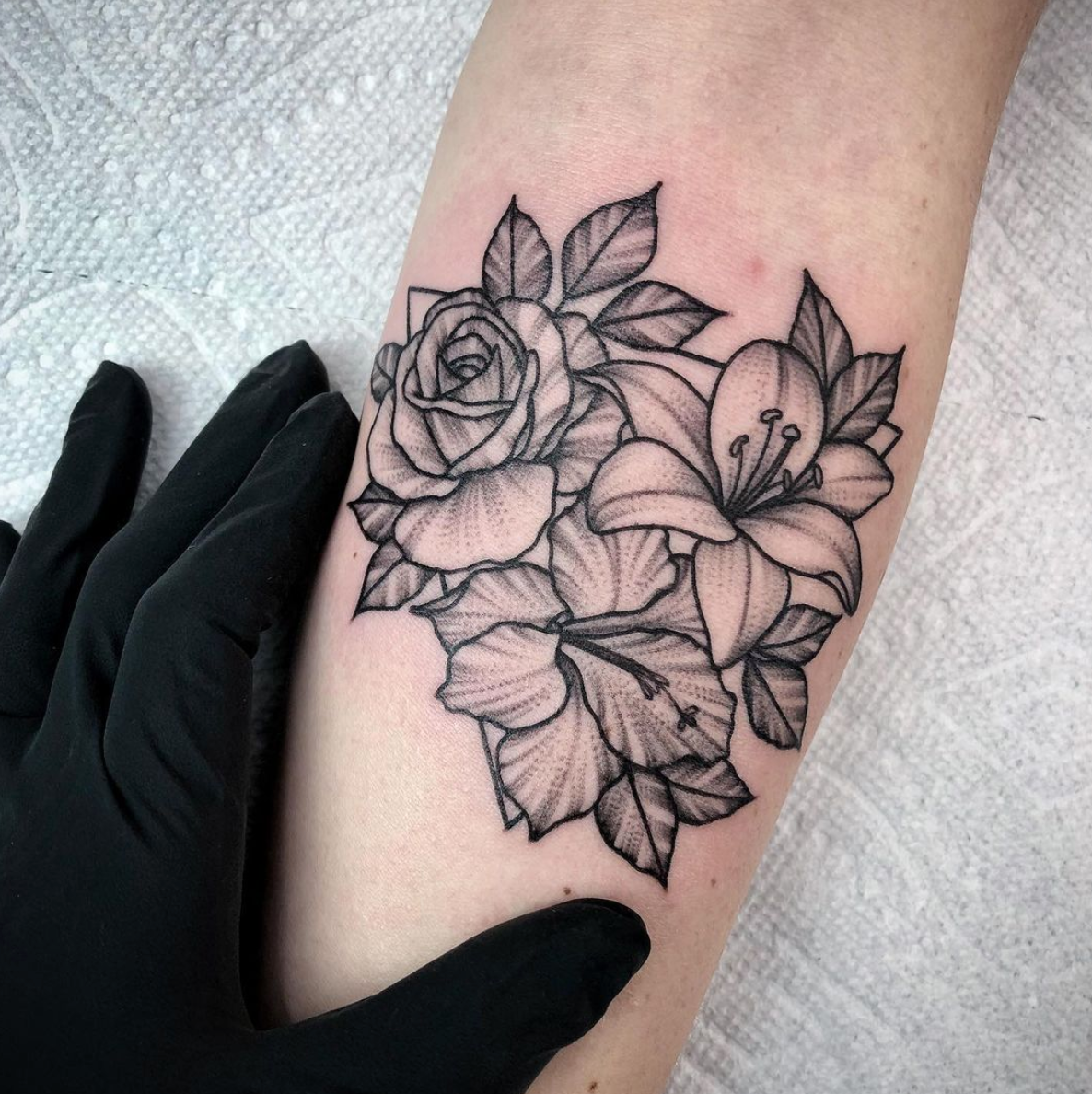 blackwork fine line floral tattoo by Janice Danger