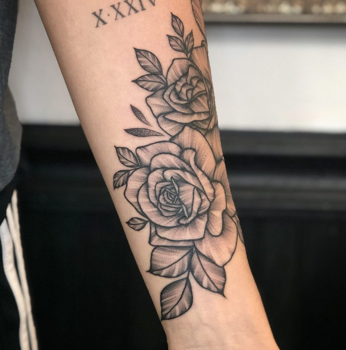 black and gray blackwork rose forearm  tattoo with stipple shading by Janice Danger
