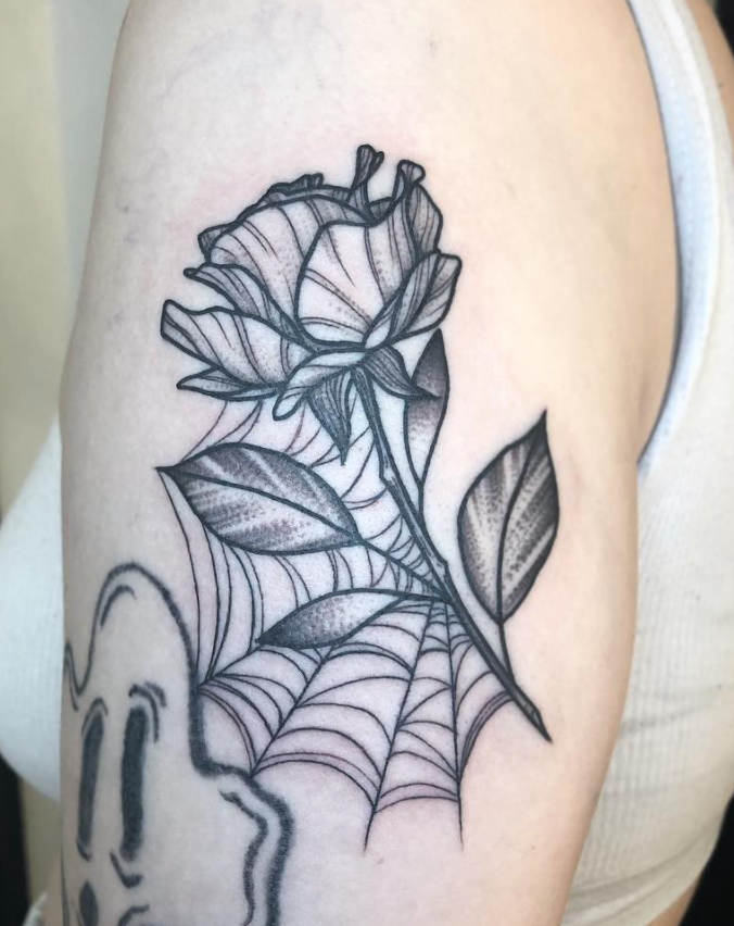 Rose and spiderweb black and grey blackwork arm tattoo by Janice Danger