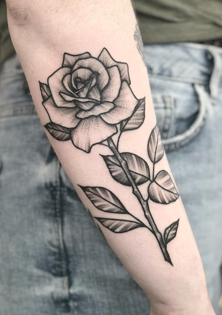 blackwork rose forearm tattoo with stippled shading by Janice Danger