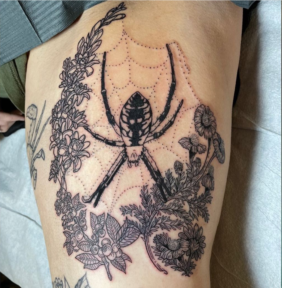 blackwork spider tattoo with foliage, florals and delicate spider web by Mehak Basu