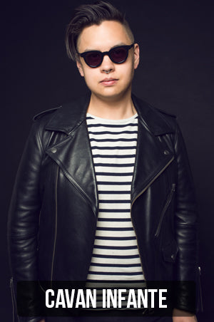photograph of Cavan Infante wearing a striped t-shirt on a black background with link to his portfolio page