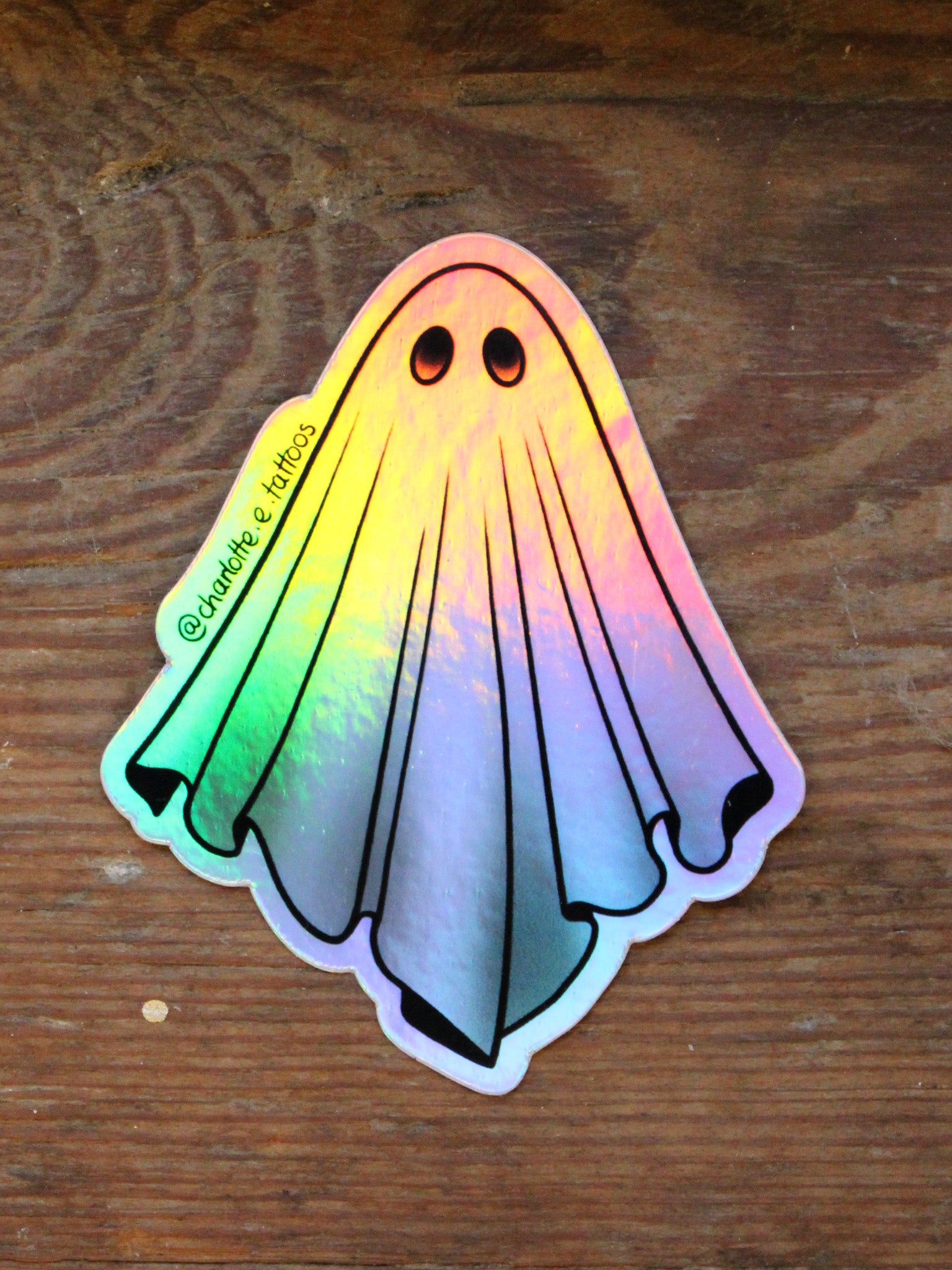 Holographic Ghost Sticker