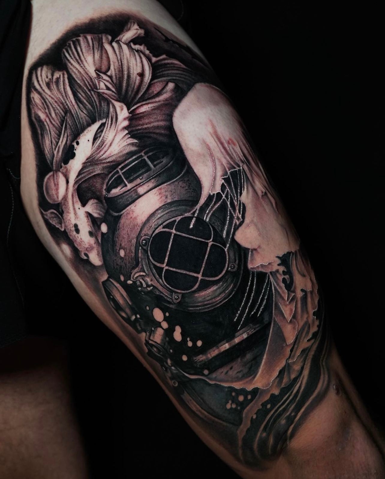 black and Gray realism under sea tattoo featuring a fish, jelly fish and scuba diver made by Joanna Gacek