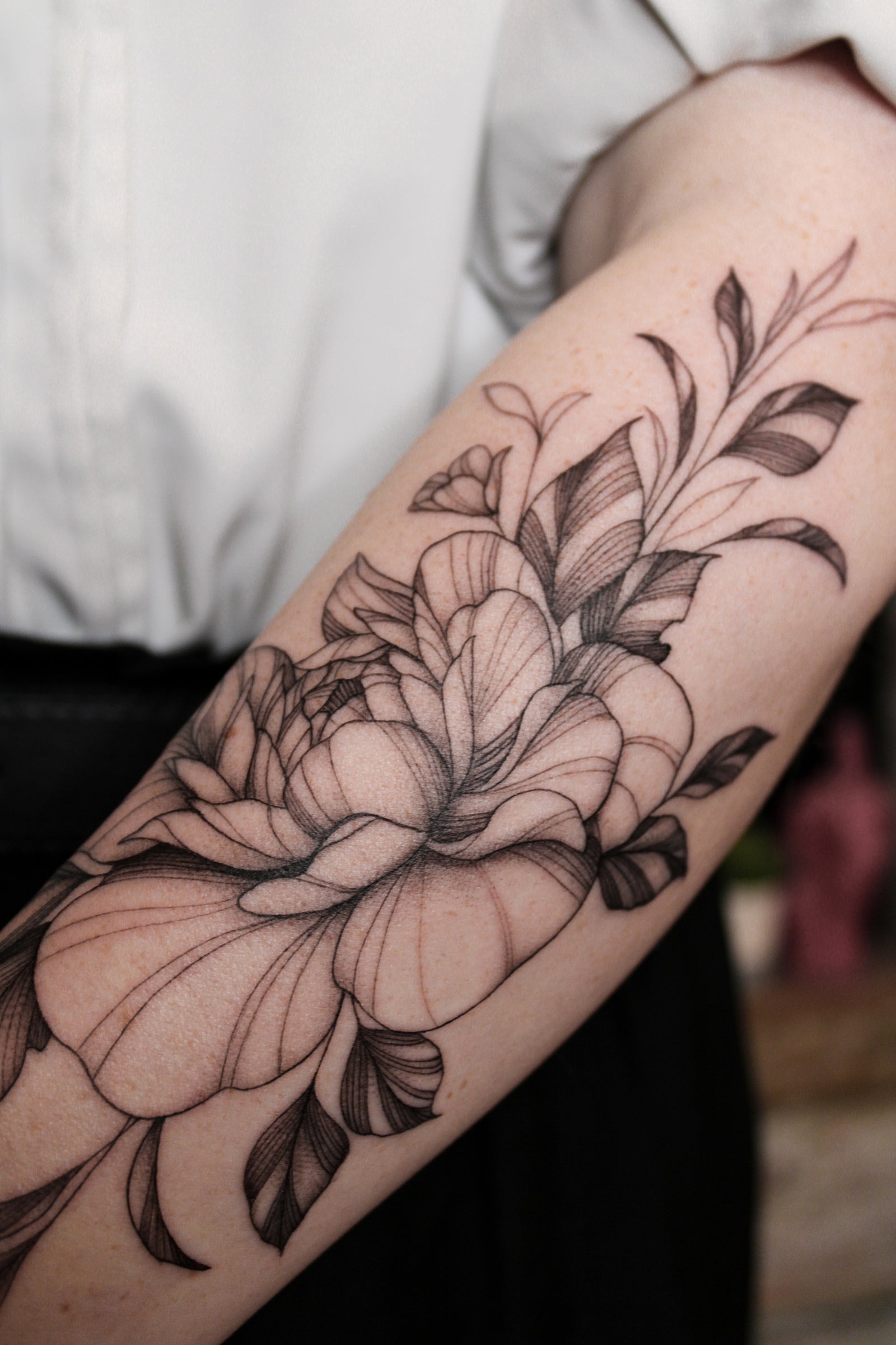 black work black and gray floral forearm tattoo by Janice Danger