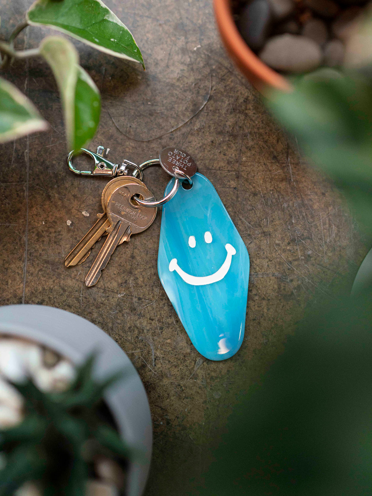 Happy Face Blue Motel Keytag