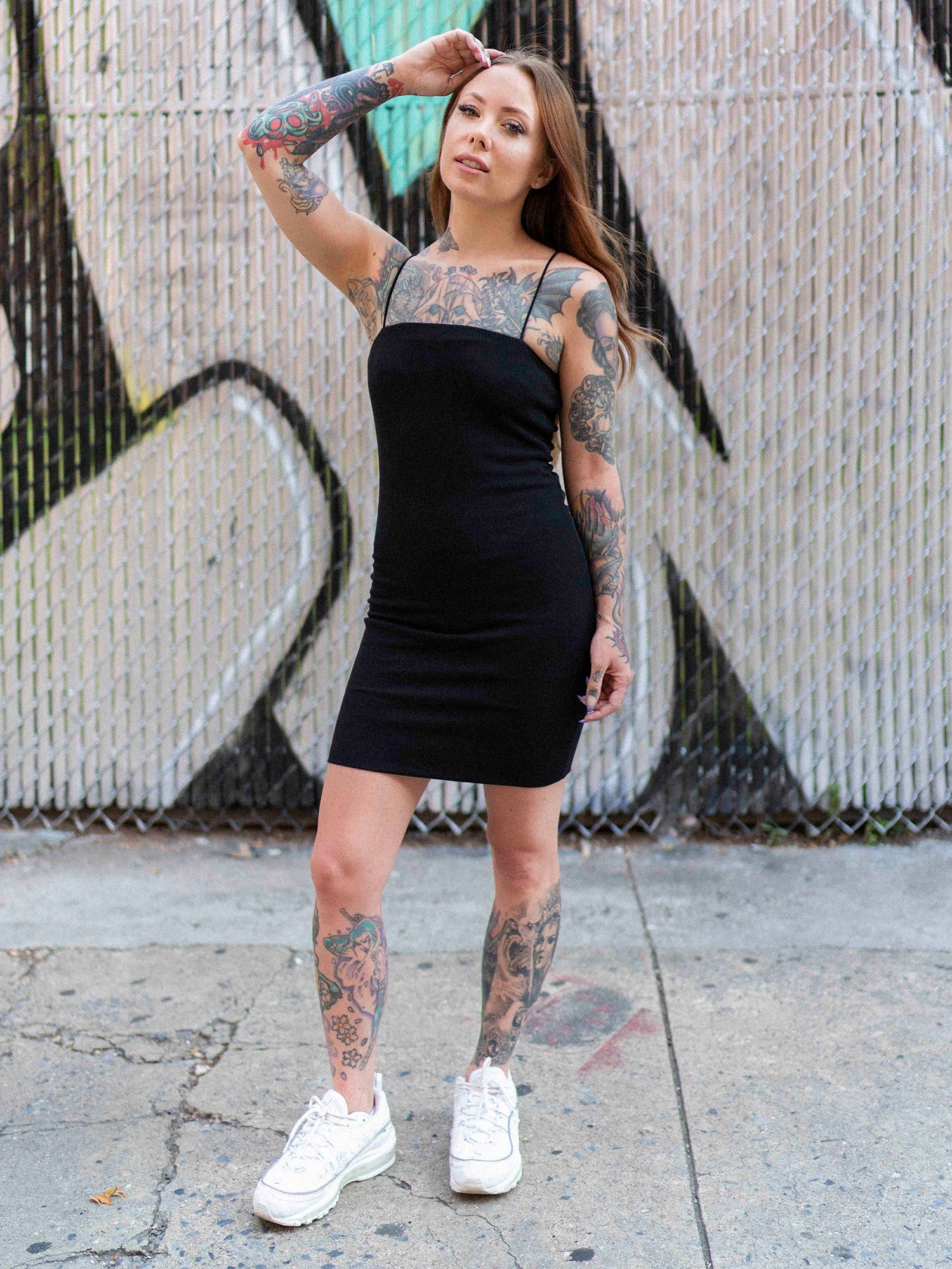 Megan Massacre wearing the black spaghetti strap Take on Me mini dress