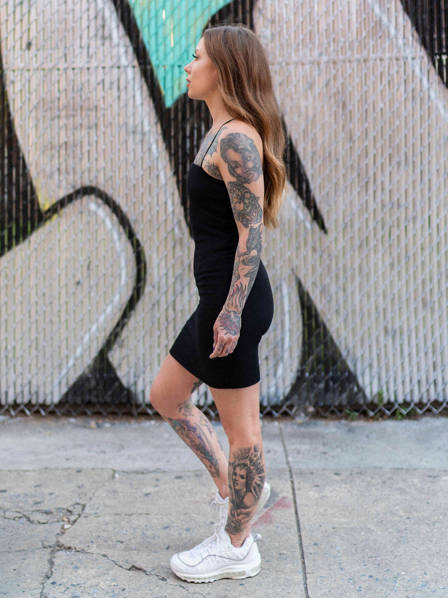 Megan Massacre wearing the black spaghetti strap Take on Me mini dress