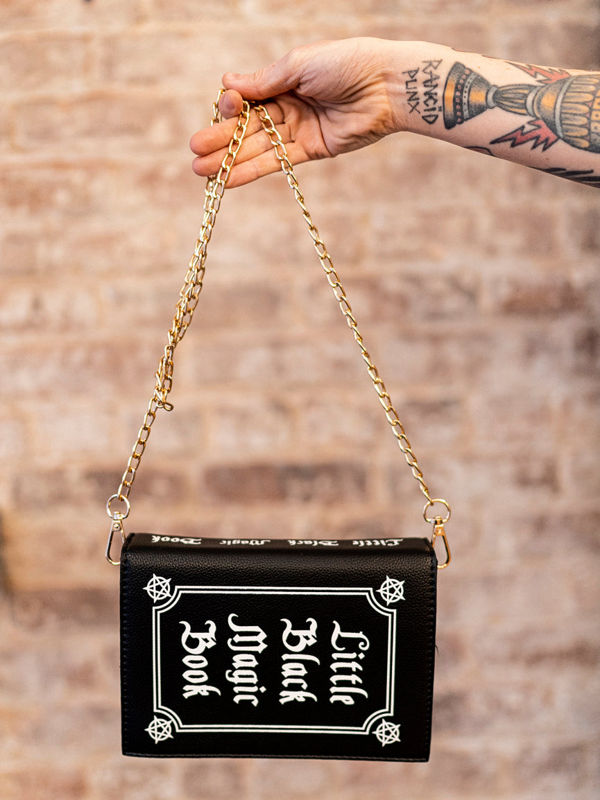 Little black on sale magic book purse
