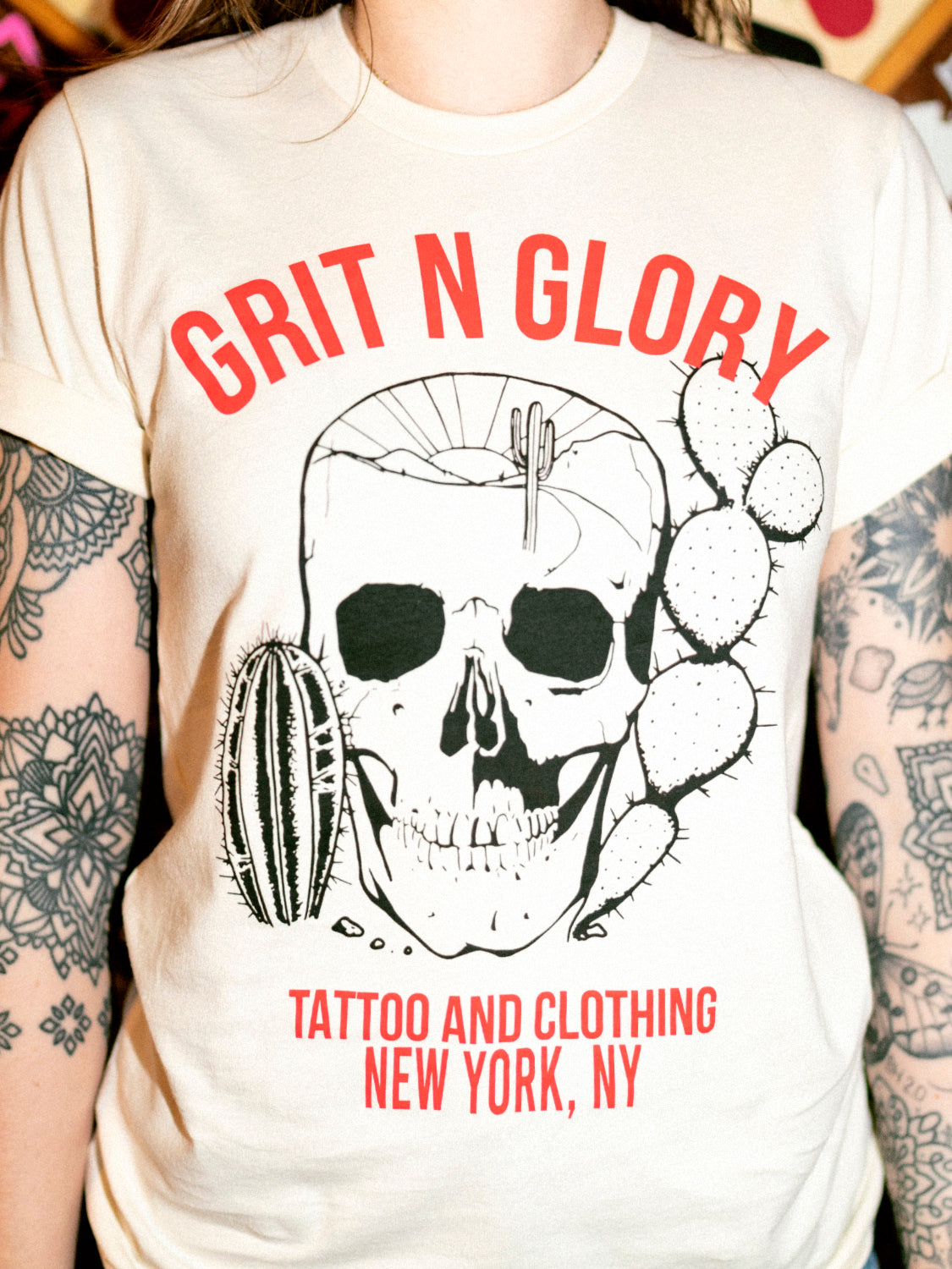 Close up of the Desert Tee with grit n glory skull, cacti, and red souvineer style text that reads "Grit N Glory Tattoo and Clothing New York NY" 
